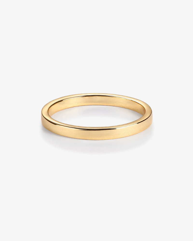 Gold ring on a white background