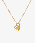 Gold necklace with a heart-shaped pendant on a white background