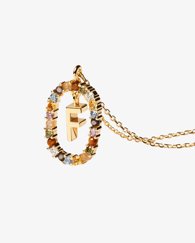 Gold necklace with a letter 'F' pendant on a white background