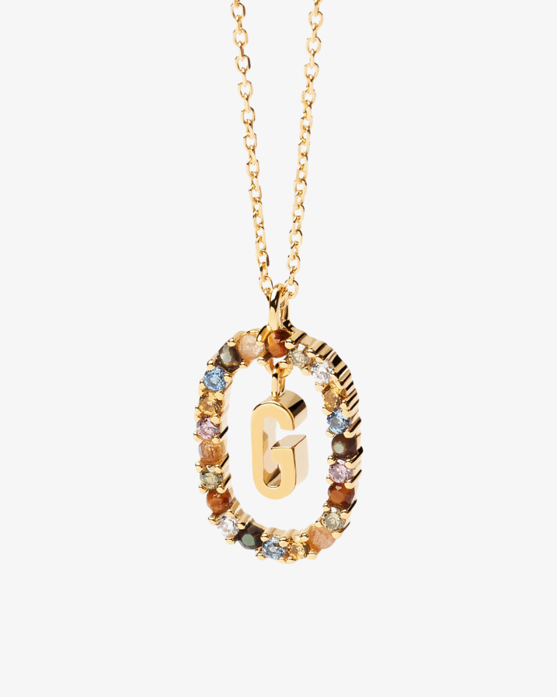 Gold necklace with a multicolored pendant and letter 'G' on a white background