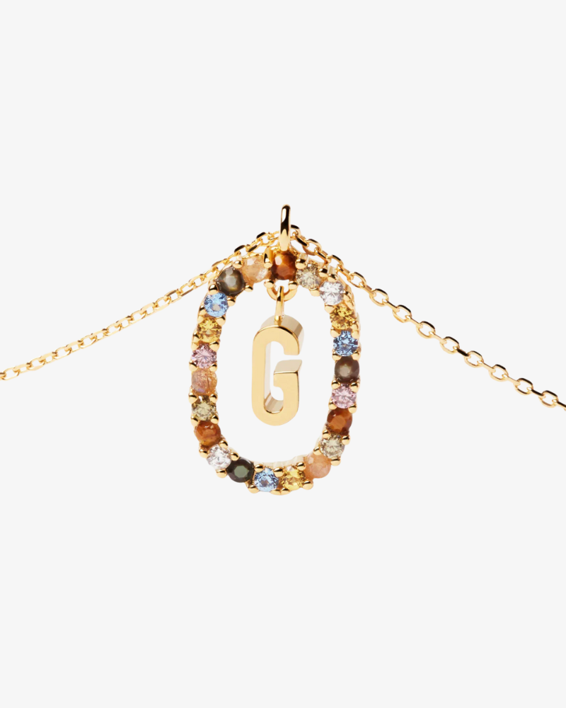 Necklace with a pendant featuring the letter 'G' on a white background