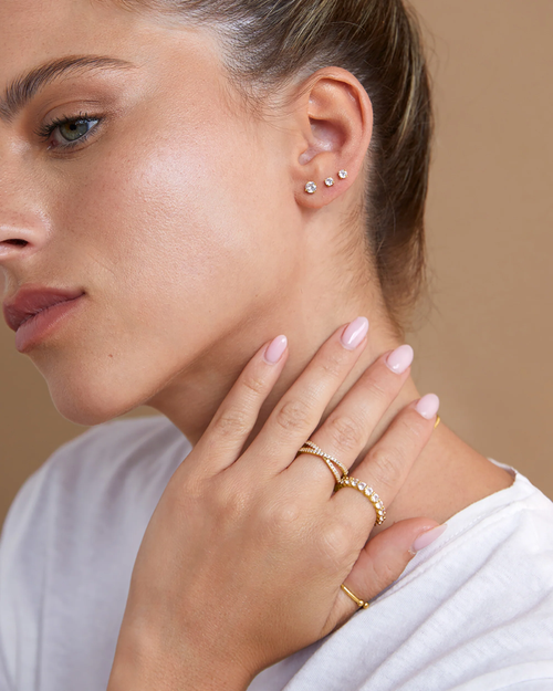 Model wearing Cubic Zirconia Flatback Stud in Helix and Lobe piercing