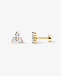 Gold earrings with clear gemstones on a white background