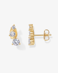 Gold earrings with clear gemstones on a white background