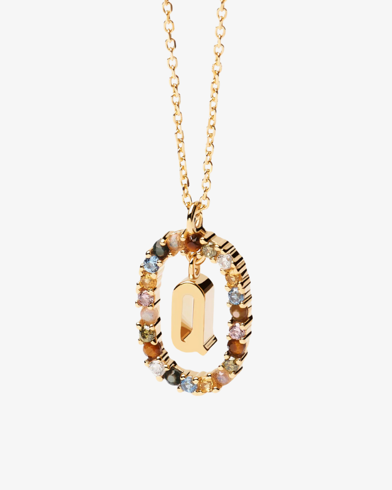 Gold necklace with a multicolored pendant on a white background