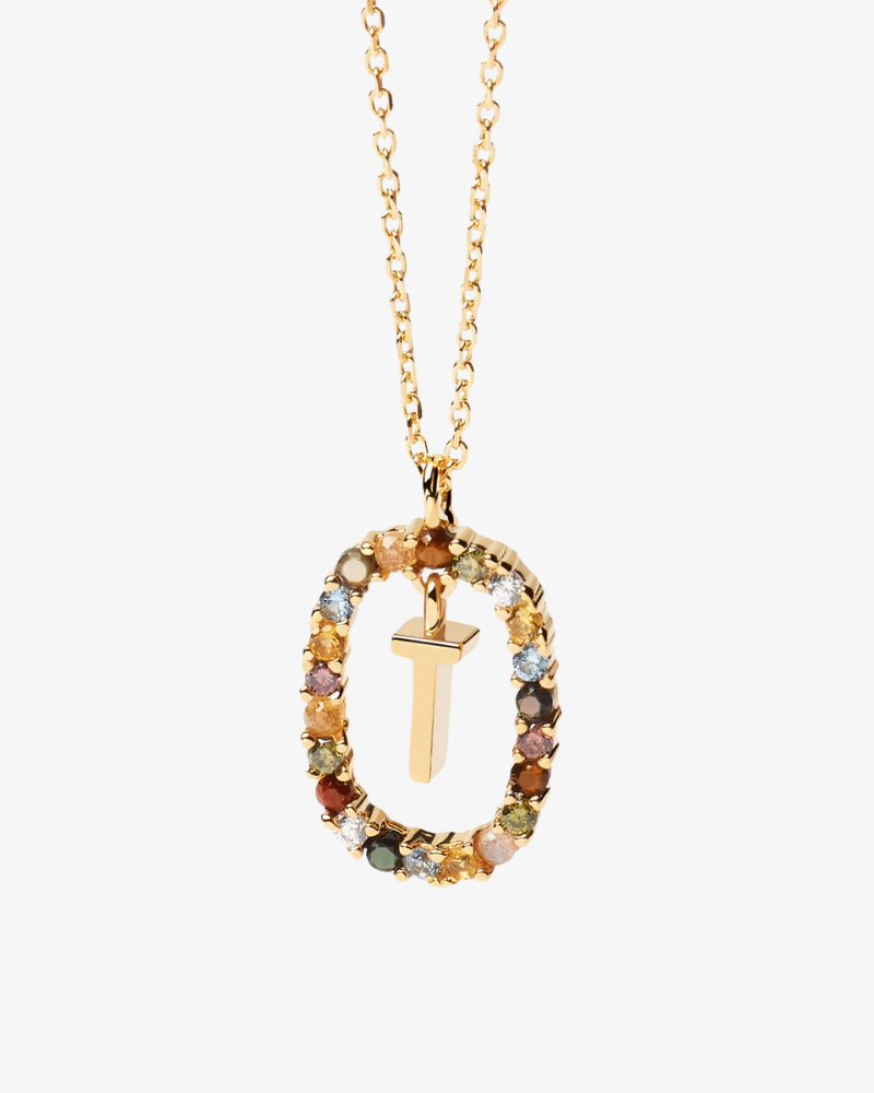 Gold necklace with a pendant featuring multicolored stones on a white background