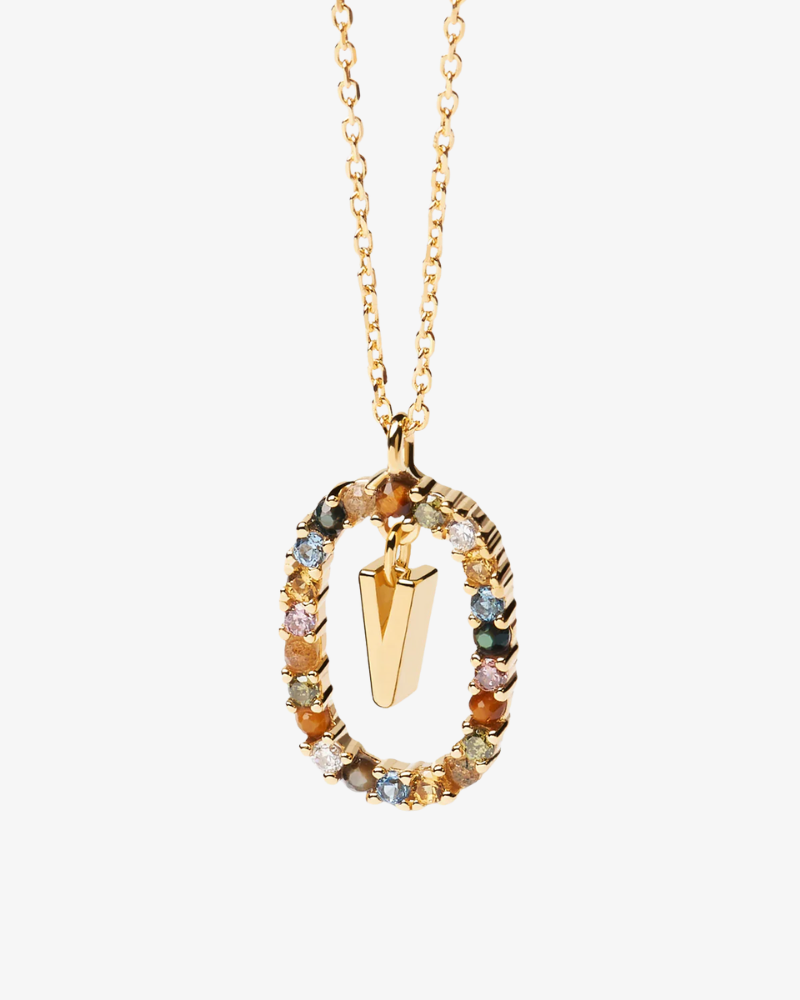 Gold necklace with a colorful pendant on a white background