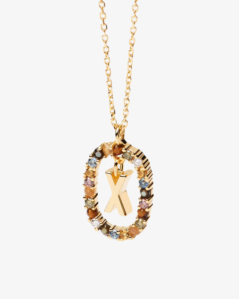 Gold necklace with a multicolored 'X' pendant on a white background