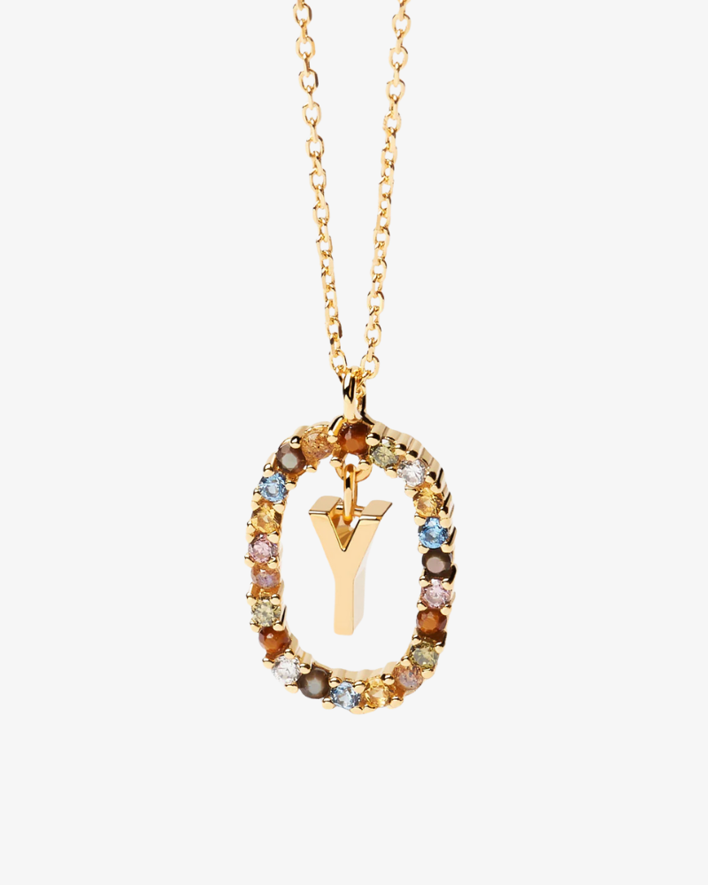 Gold necklace with a multicolored 'Y' pendant on a white background