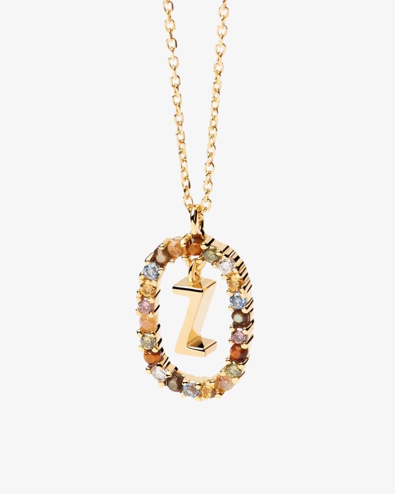Gold necklace with a multicolored 'Z' pendant on a white background